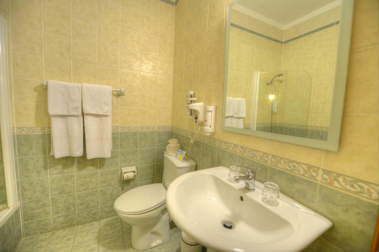 Downtown Hotel Виктория Экстерьер фото